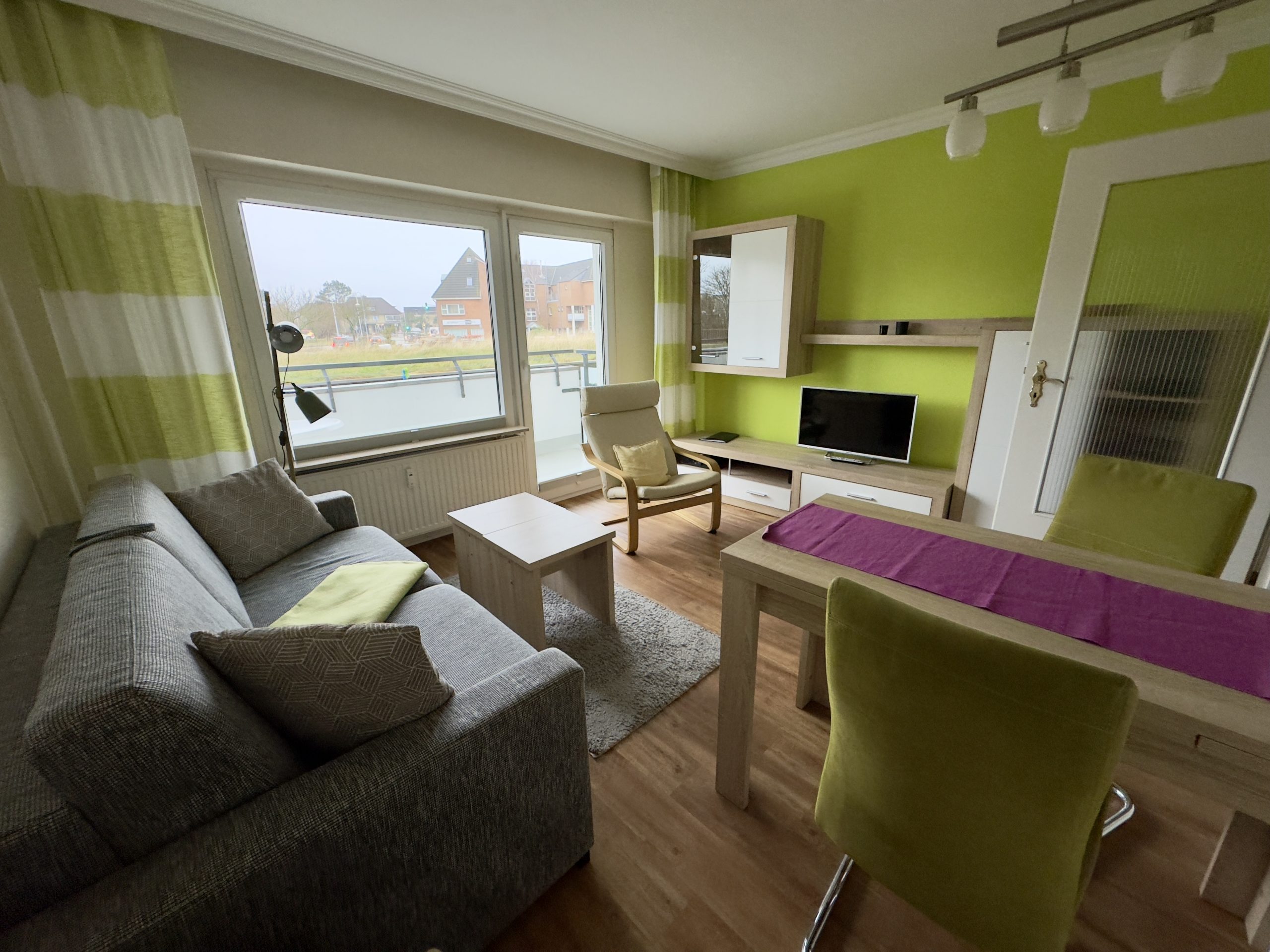 Wohnzimmer mit Schlafsofa, Ferienwohnung 6, Haus Nordland, Westerland, Sylt